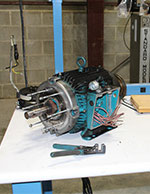 Overhead Crane and Hoist motor disassembled for repair in TSOC's service department.