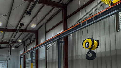 5-Ton R&M Wire Rope Hoist on Engineered Crane Runway System at Oil Recycling Facility