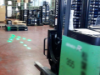 Hololight Dot Arrow used to direct traffic of forklift.